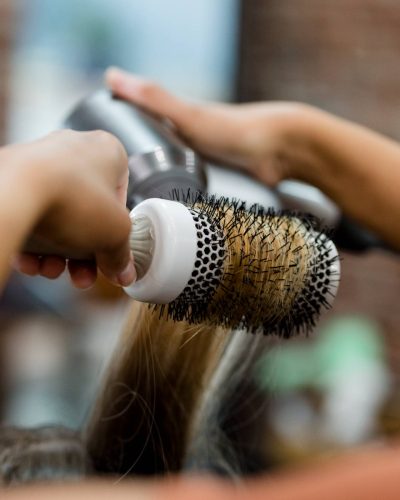 hairstylist-blow-drying-the-customers-hair-2022-03-18-09-07-13-utc(1)